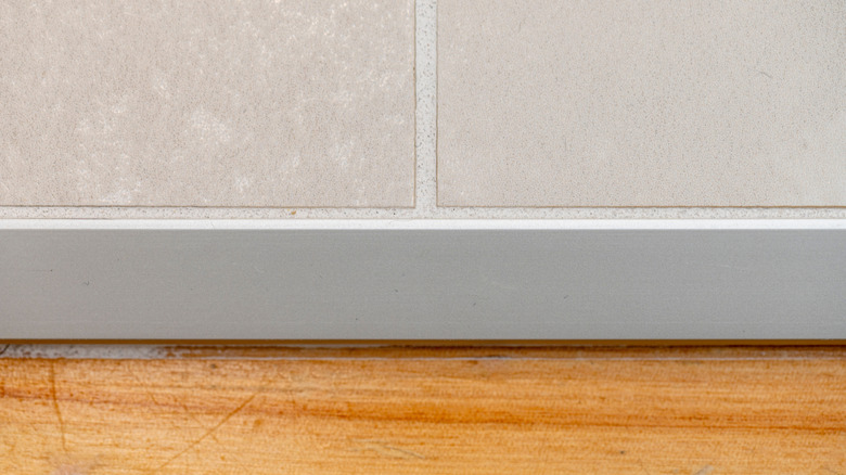 Light wood floor and gray tile