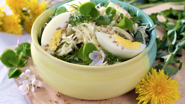 bowl of eggs and greens