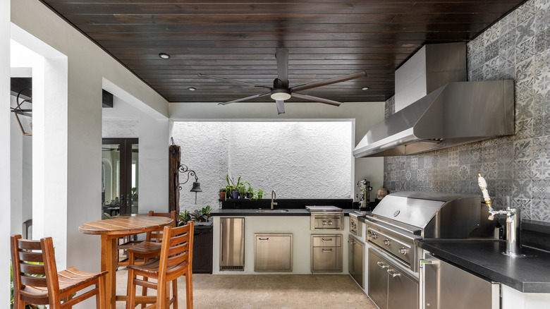 Dark-colored wood planks on ceiling