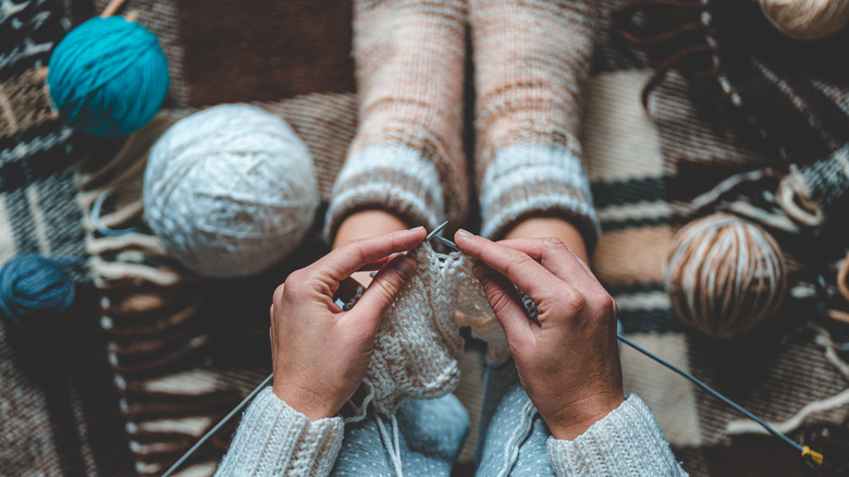 A person knitting