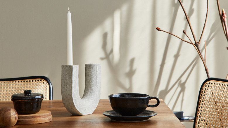 U shaped white candle holder