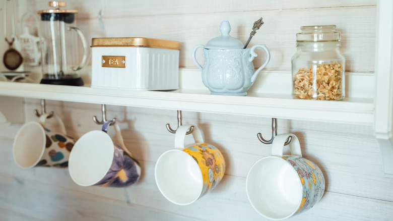 mugs hanging on hooks