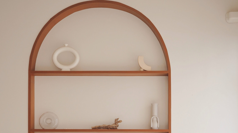 wooden arch decorated shelves
