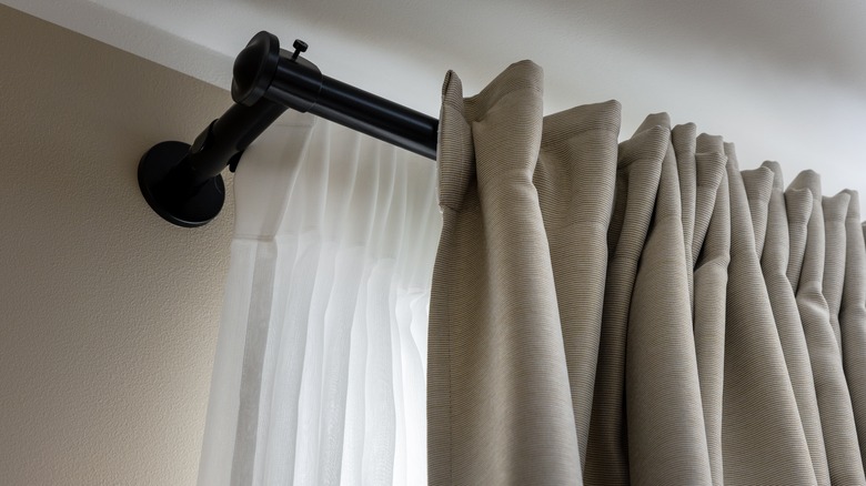 sheer curtains behind gray ones