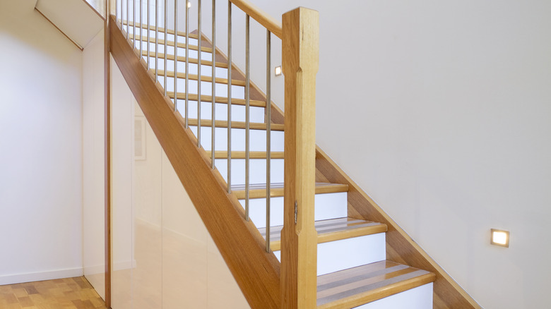 white risers on wooden stairs