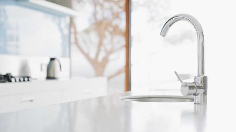 kitchen sink with white countertop