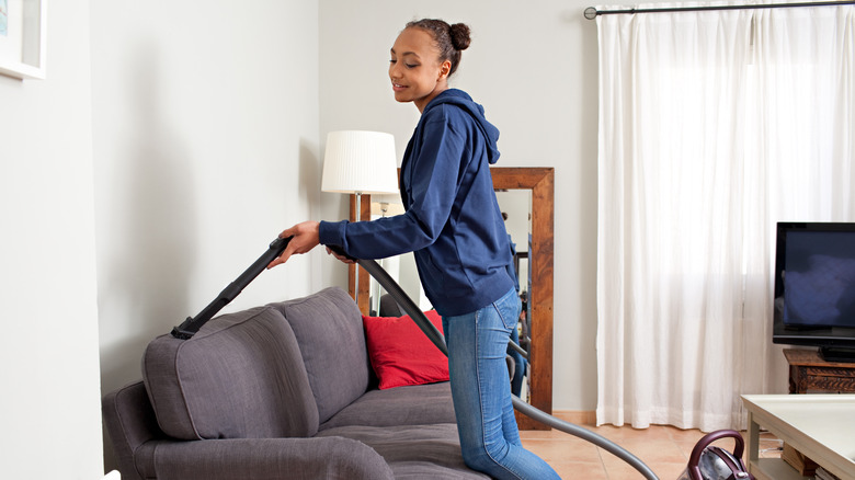 vacuuming couch