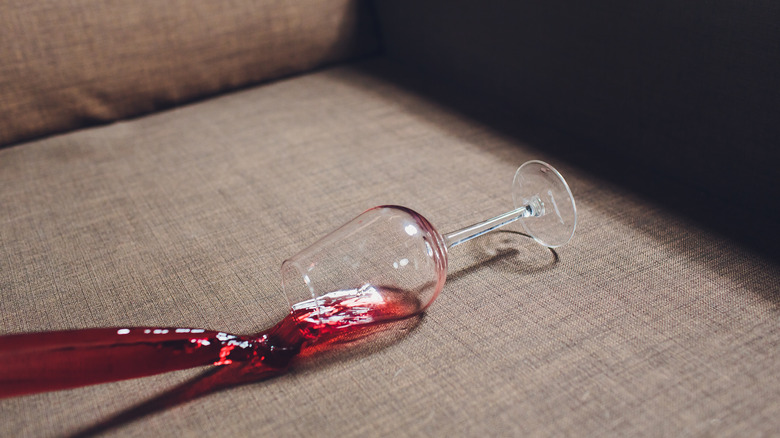 spilling wine on couch