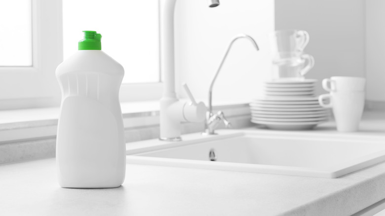 dishwashing liquid on kitchen sink 