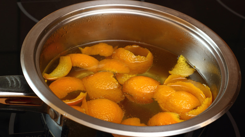 citrus peels simmering on stove 