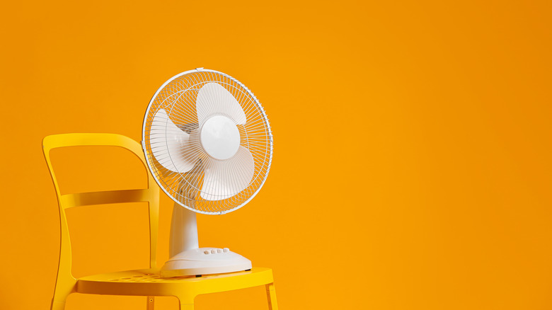 Rotating fan orange background
