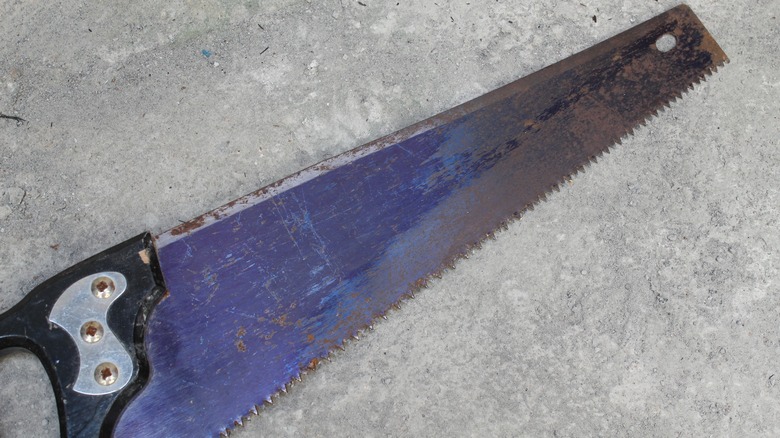 rusty hand saw