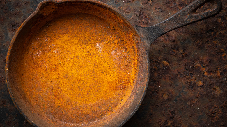 rusty cast iron skillet