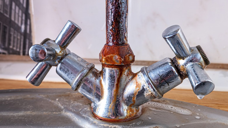 rusty chromed kitchen faucet