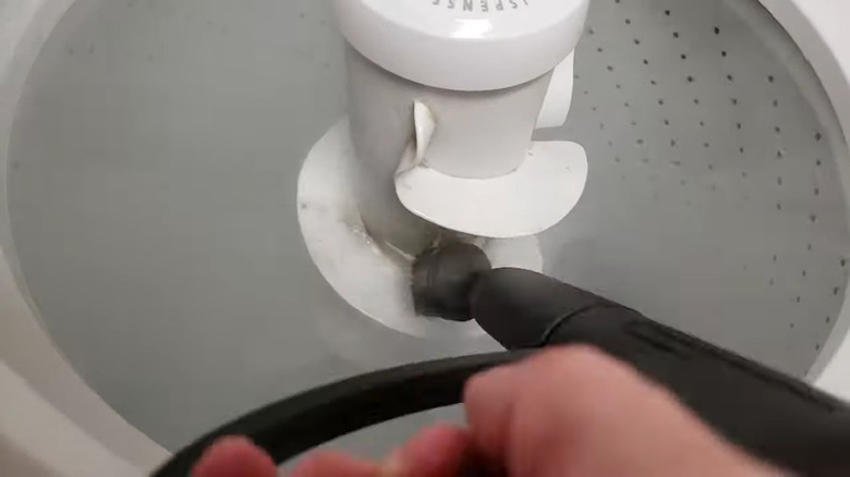Using a steam cleaner on a washing machine