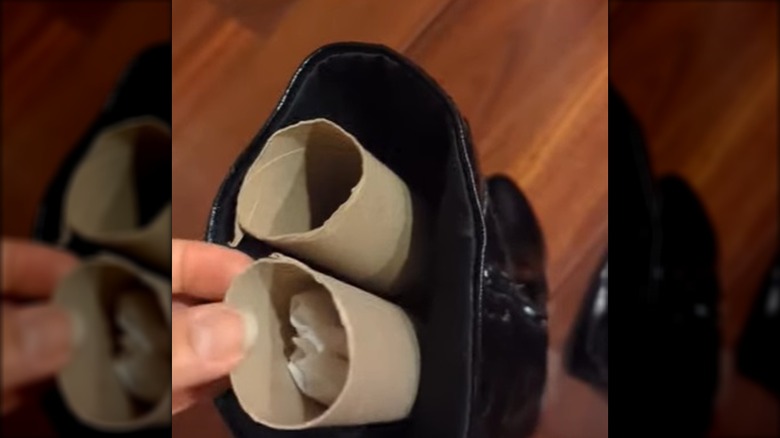 Paper towel rolls inserted in boots to keep their shape