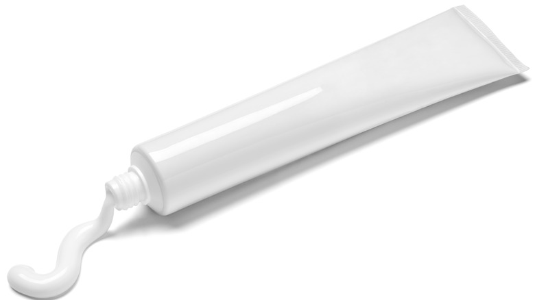 A white tube of toothpaste