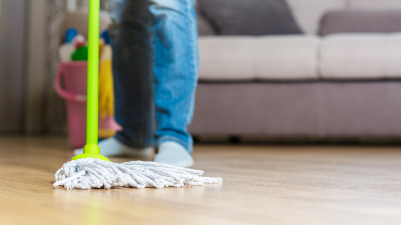 Person mopping floor