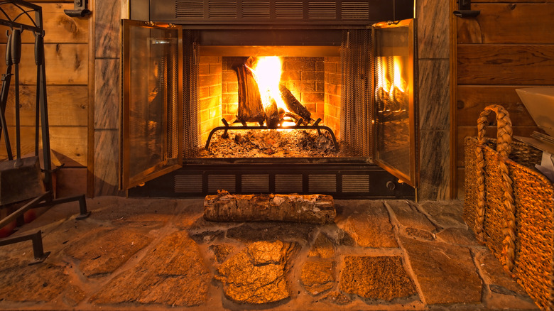 fire in stone fireplace