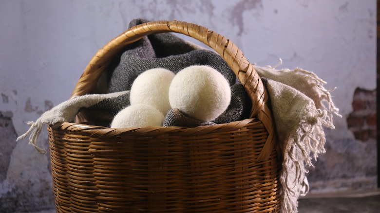 Basket with dryer balls and blanket