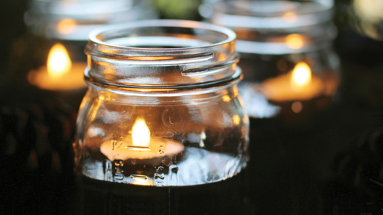 Glass jar with candle