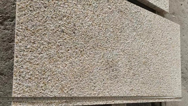 bush hammered granite slab