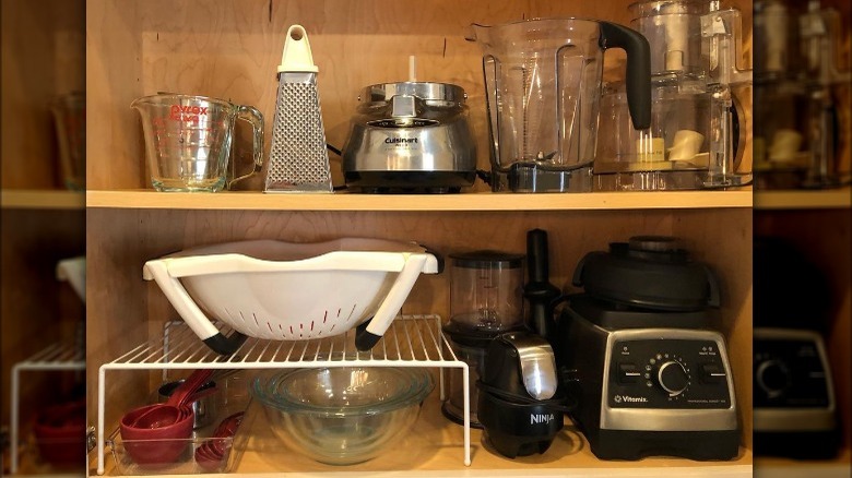 Baking supplies organized on shelf raiser