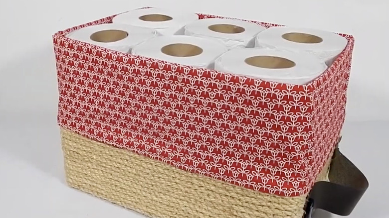 Decorative box holding toilet paper