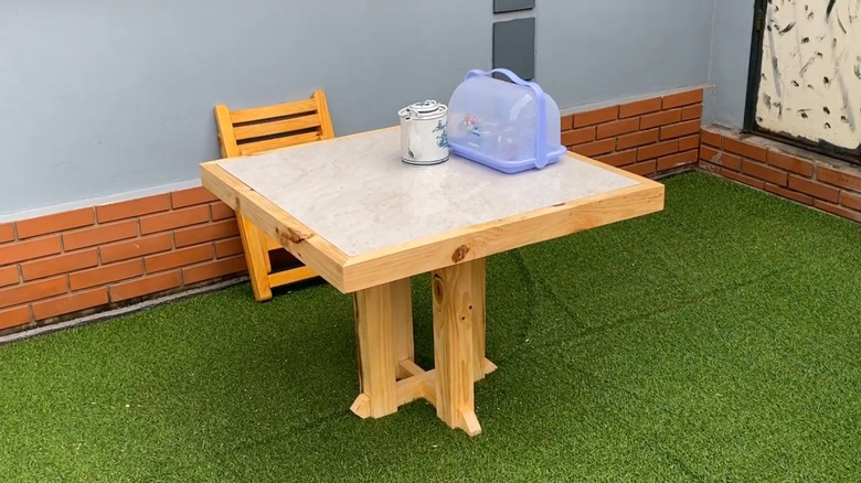 Table made with large-format tile or multiple pavers