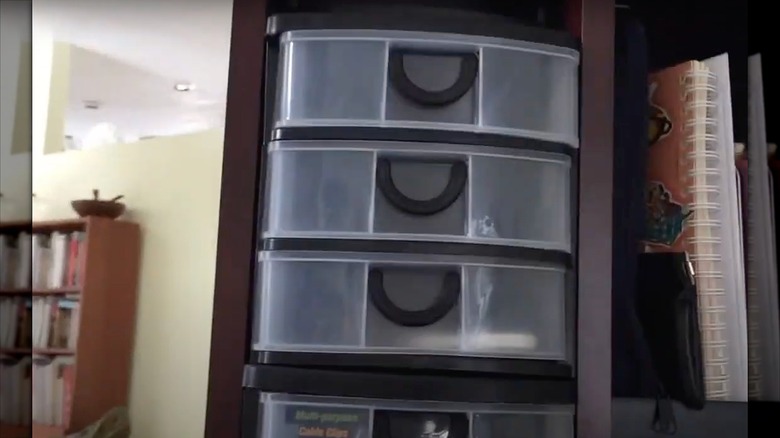 Plastic storge drawers inserted into upcycled CD storage