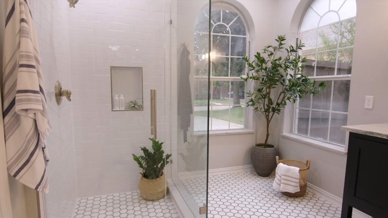 Shower with white herringbone subway tiles