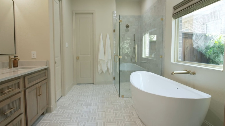 clean modern bathroom with tub