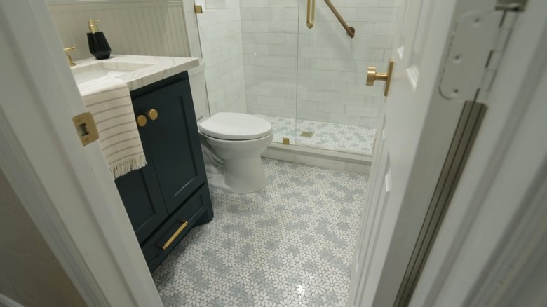 Bathroom with floral tile designed by Jenn Todryk