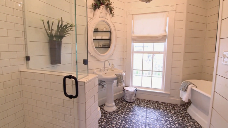 white bathroom with tile floors