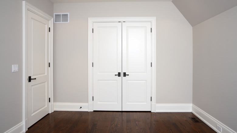 closet with white french doors