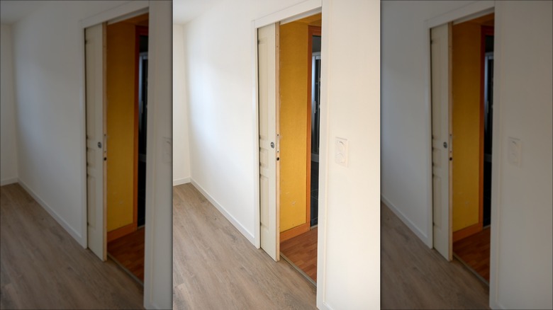 pocket door in white room