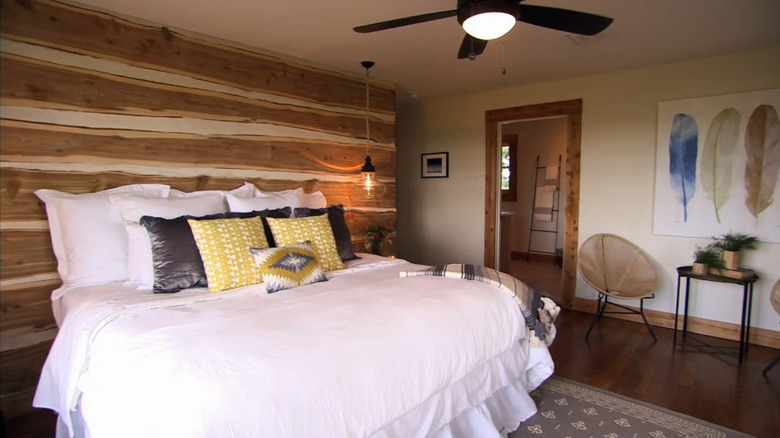 Cedarwood accent wall in southwestern bedroom