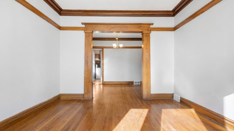 living room with natural wood trim