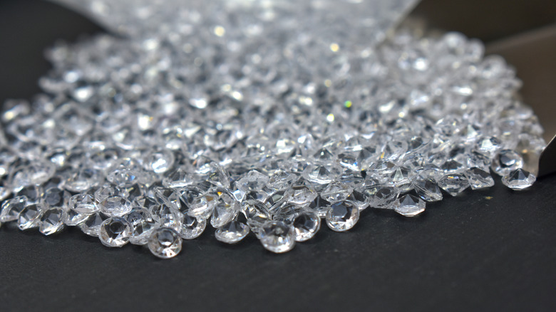 A pile of clear plastic diamonds