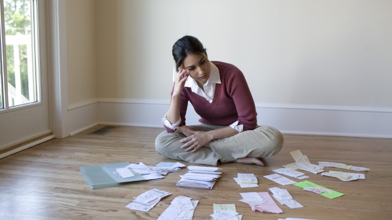 Woman worrying about debt