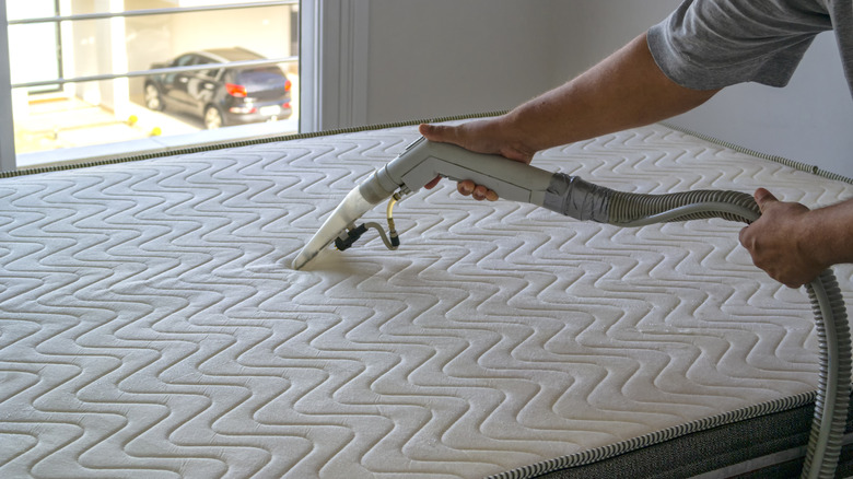 vacuuming mattress with attachment