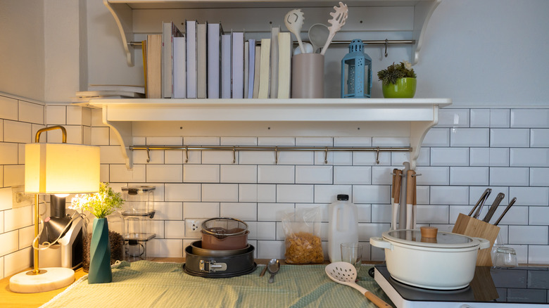 Cookbooks on a shelf in the kitchen