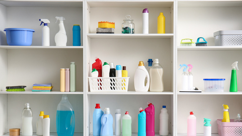 Cleaning supplies on open shelves