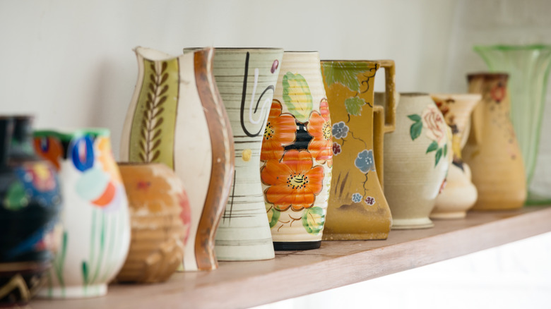 Painted pottery on an open shelf