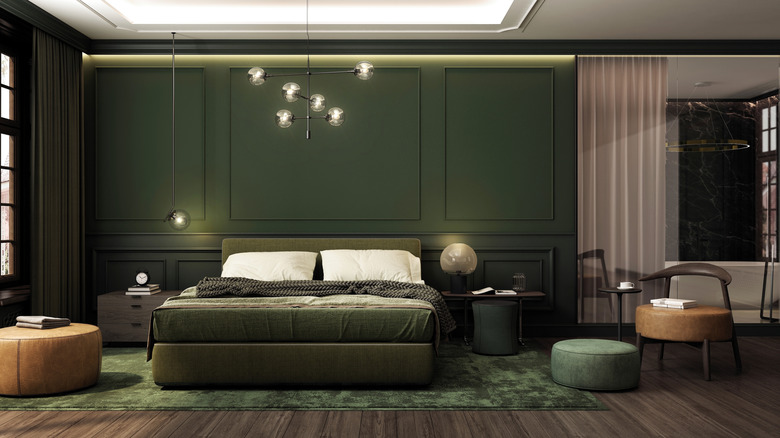 Dark green and gray colors in a bedroom