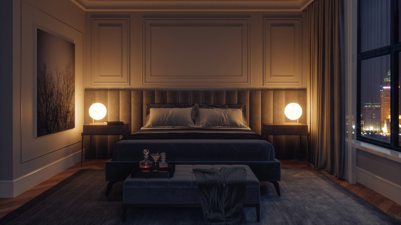 Modern moody bedroom with low light