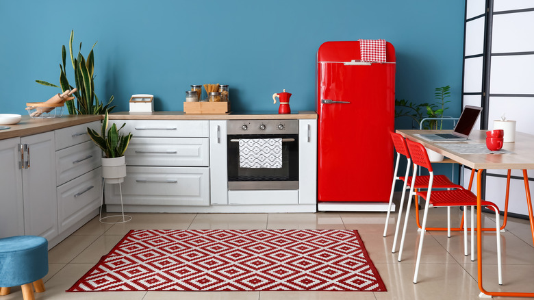 Red refrigerator in a modern kitchen