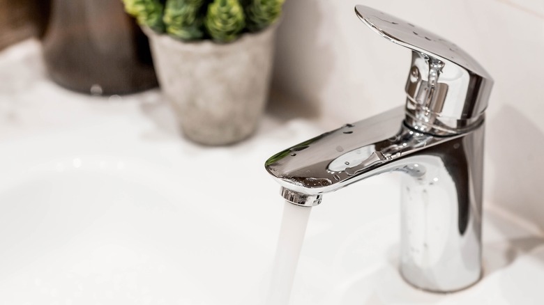 Bathroom faucet with water running