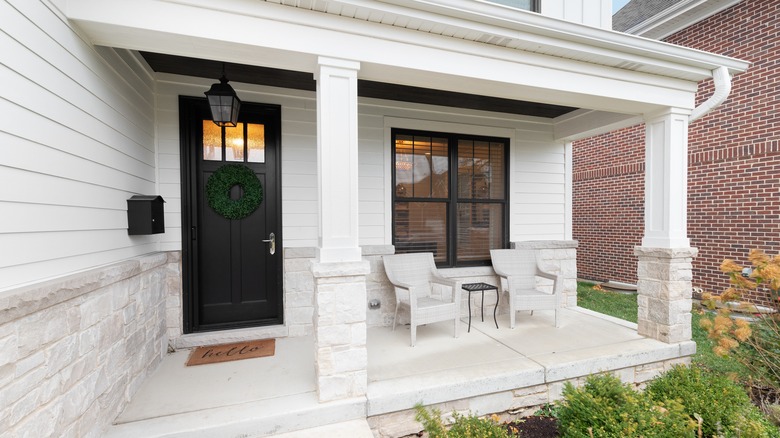 White house with black front door