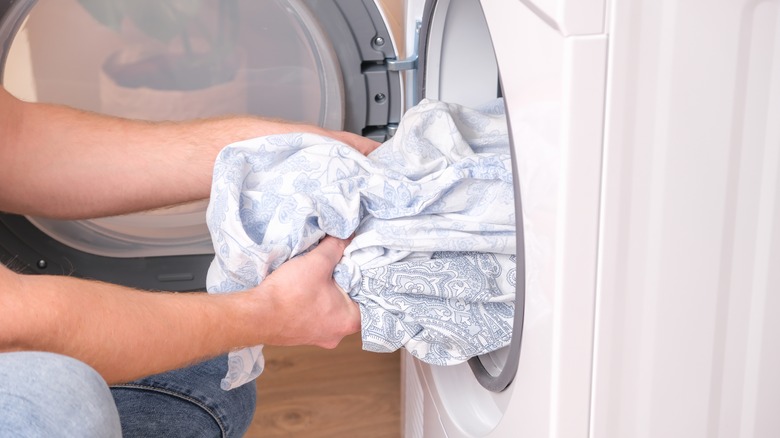 taking laundry out of washing machine